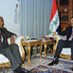 U.N. Secretary General Kofi Annan (L) and Iraq's President Saddam Hussein hold talks to defuse a crisis over United Nations weapons inspections in Iraq February 22. Annan's spokesman said after the talks he was on the verge of a breakthrough. IRAQ - RP1DRIFPRWAC